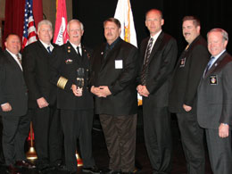 2012 James O. Page EMS Achievement Award Recipient Fire Chief William Metcalf (third from left) with EMS Section board members and Physio-Control President Brian Webster (third from right)'