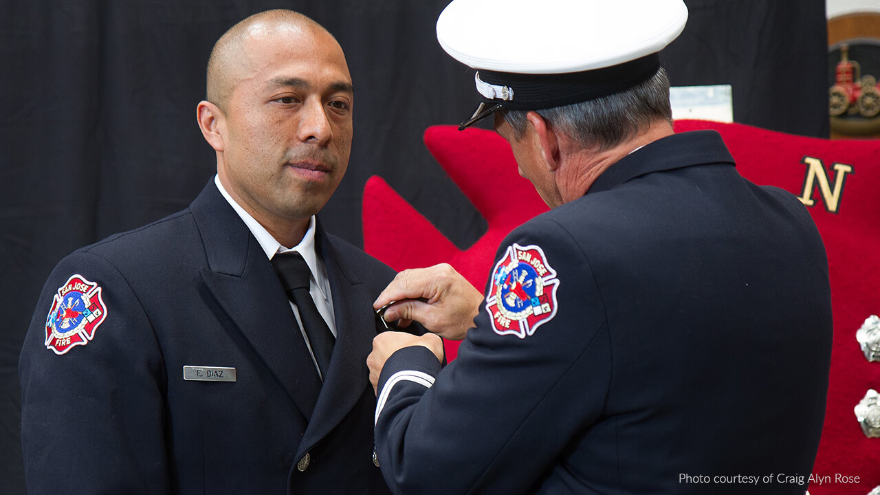 Pinning ceremony. Photo by Craig Alyn Rose