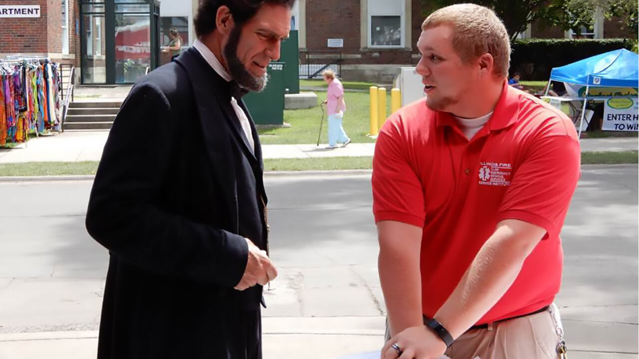 You’re never too old to learn hands-only CPR… Illini Emergency Medical Services trained President Abraham Lincoln at the Illinois State Fair!